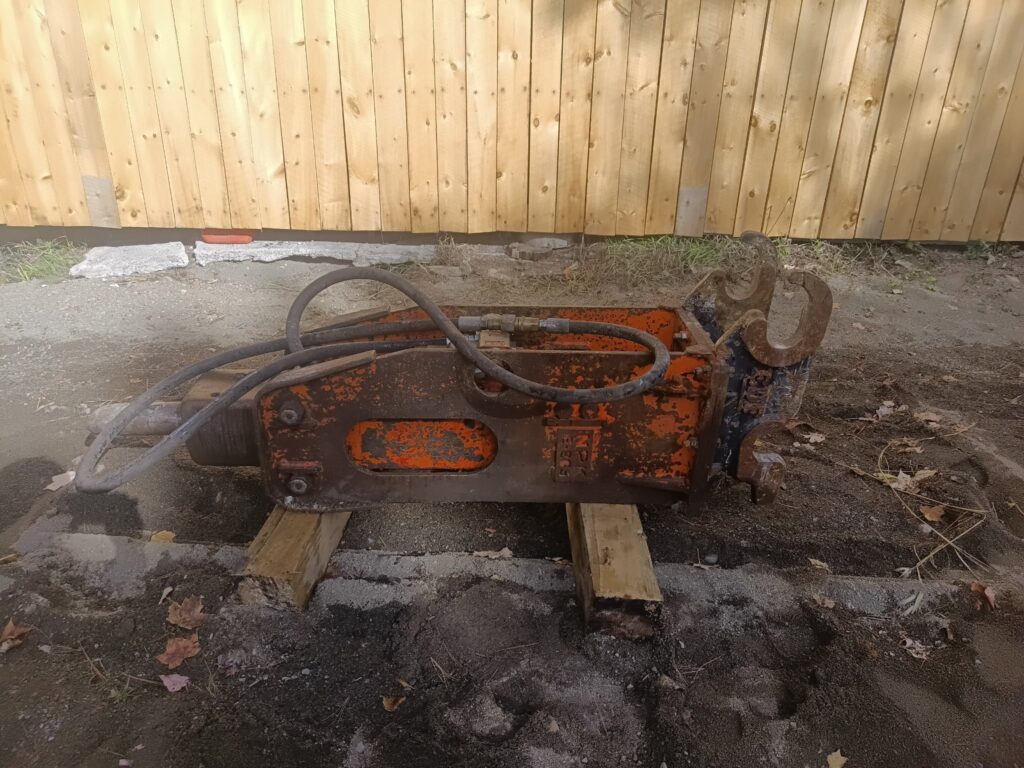NPK E205 Hydraulic Breaker with EDF Wedge Coupler